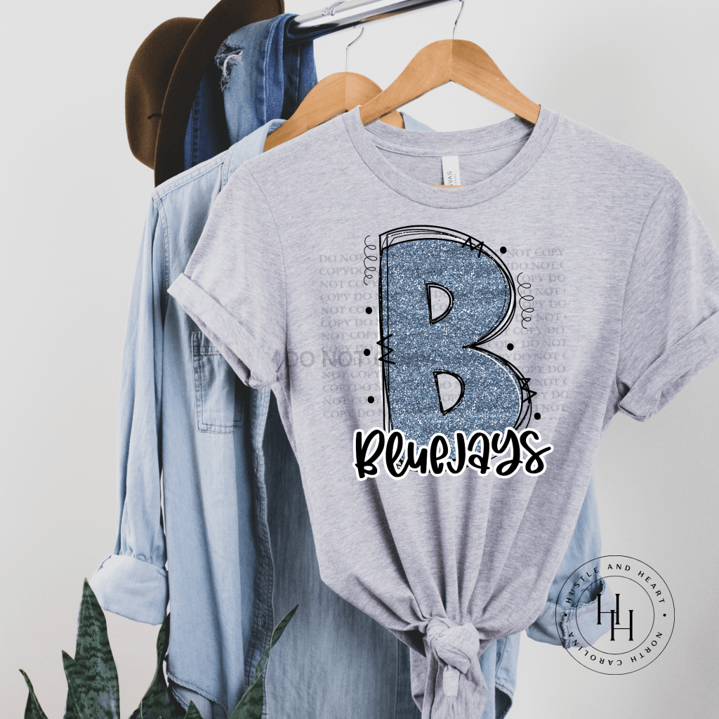 Bluejays Carolina Blue Glitter Varsity Doodle Unisex Tee