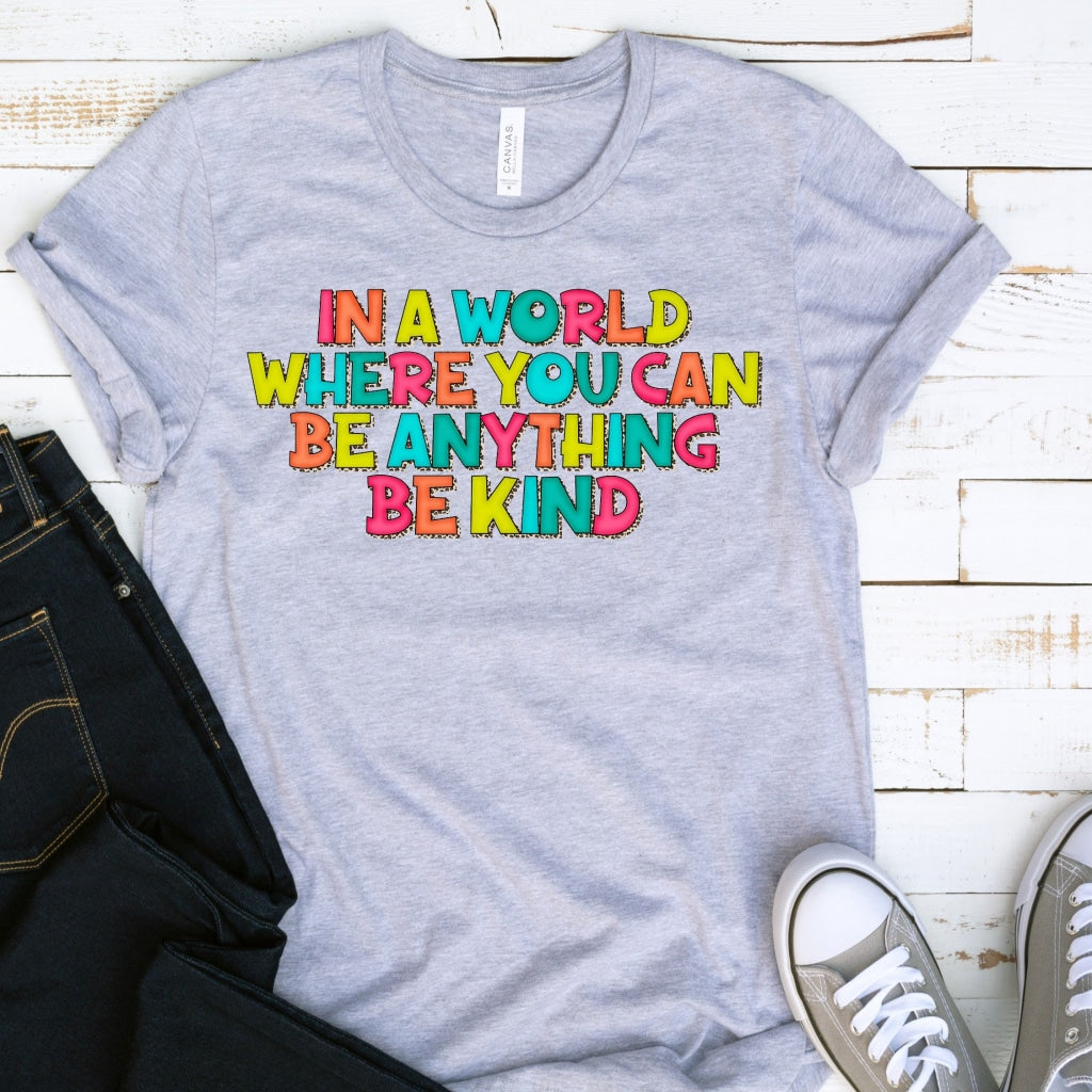 In A World Where You Can Be Anything Kind Graphic Tee Dtg